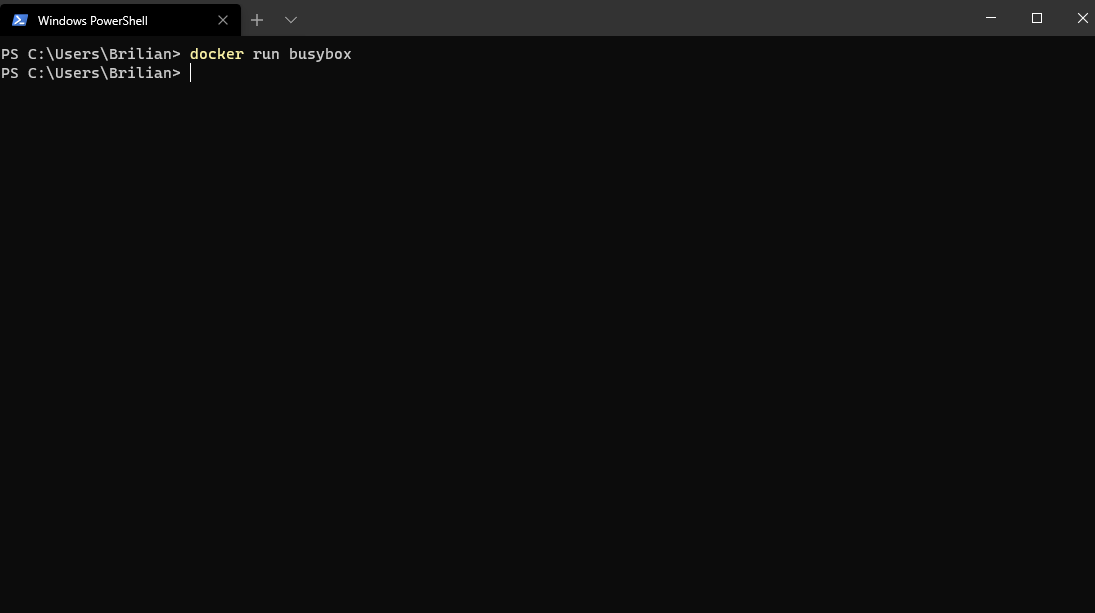 Running a BusyBox container without interactive options returns directly to the PowerShell prompt.